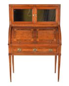 ϒ A Continental mahogany, amboyna inlaid, and rosewood banded cylinder desk