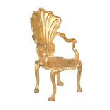 A giltwood grotto armchair