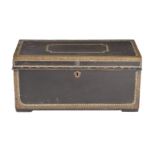 A leather and brass bound camphorwood trunk