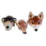 A Staffordshire bone china fox mask stirrup cup