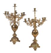 A pair of substantial gilt metal seven light candelabra