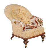 ϒ A Victorian rosewood and button upholstered low chair