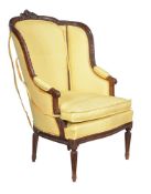 A walnut and yellow upholstered armchair in Louis XVI style