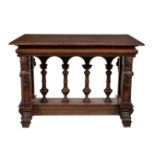 A Renaissance Revival carved walnut and serpentine marble inset centre or side table