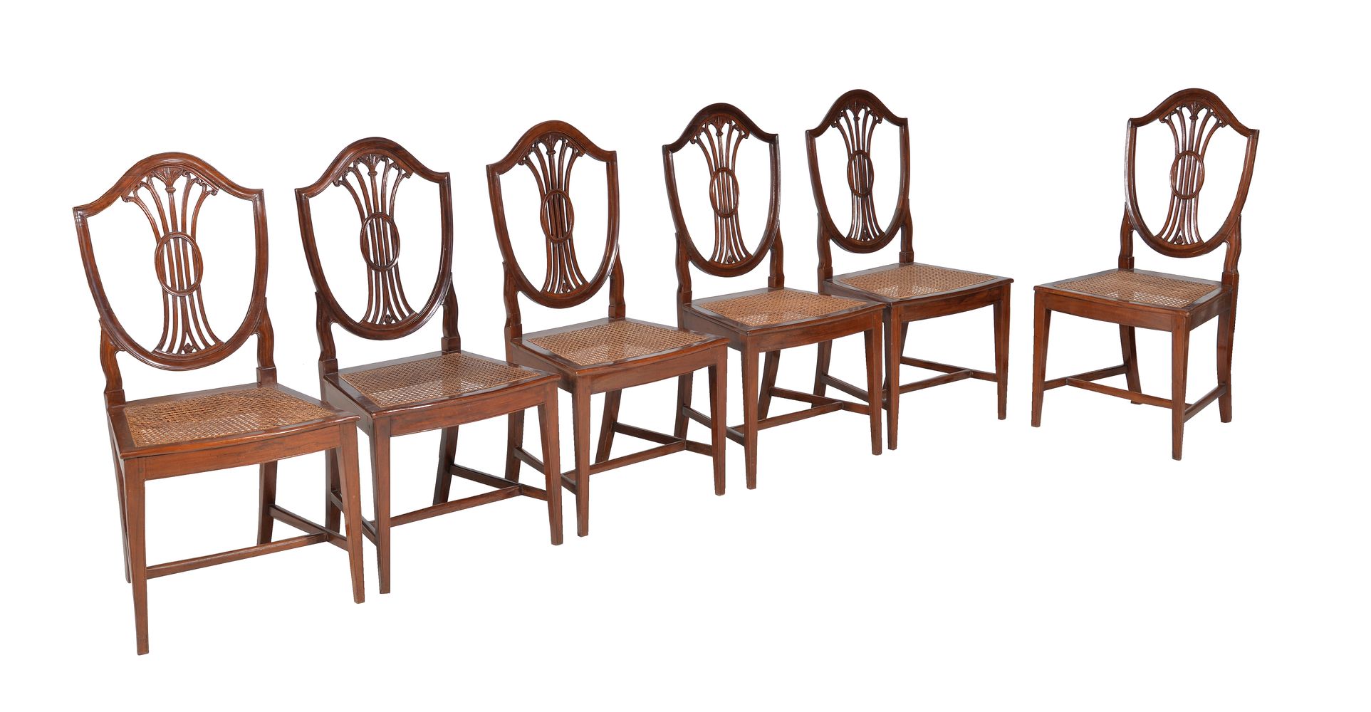 A set of six George III mahogany dining chairs