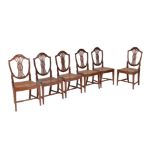 A set of six George III mahogany dining chairs