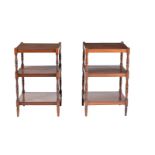 A pair of mahogany three tier side tables