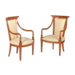 A pair of simulated amboyna and upholstered armchairs