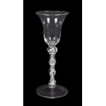 A multi-knopped opaque-twist wine glass