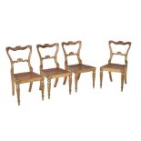 A set of four George IV giltwood side chairs