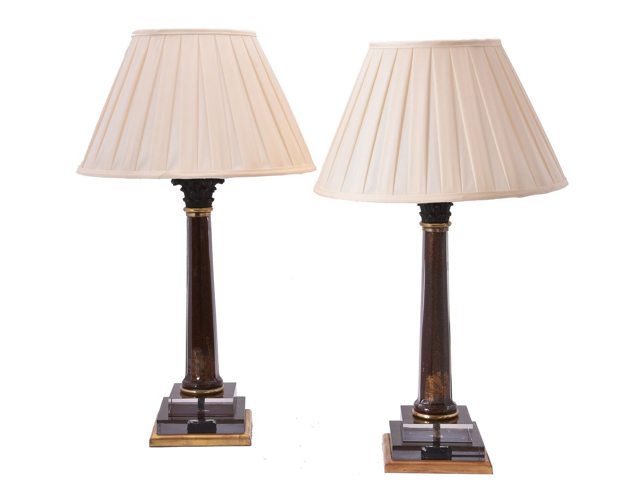 A pair of gilt metal mounted tinted glass table lamps