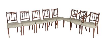A set of eight George III mahogany dining chairs