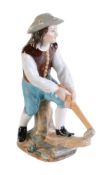 A Moscow porcelain (Popov Factory) model of an axeman