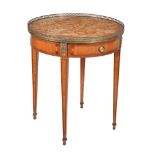 ϒ A tulipwood, parquetry and gilt metal mounted gueridon table