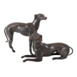 Two patinated metal models of whippets