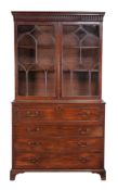 A George III mahogany and inlaid secretaire bookcase