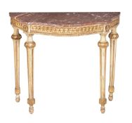 A Continental cream painted and parcel gilt console table
