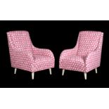 A pair of upholstered armchairs