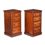 A pair of mahogany bedside pedestal chests