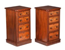 A pair of mahogany bedside pedestal chests