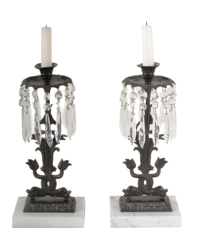 A pair of patinated metal, cut glass and marble mounted lustre candlesticks in Regency taste