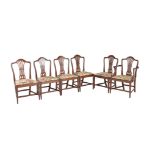 A set of twelve mahogany dining chairs