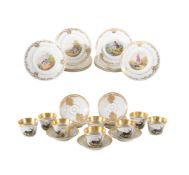 A set of eight German porcelain teacups and saucers