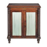 ϒ A Regency rosewood and metal mounted side cabinet