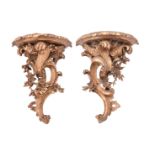 A pair of carved and giltwood wall brackets in late Louis XV taste