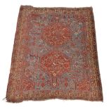 A group of three rugs