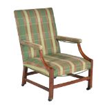 A mahogany and upholstered library armchair