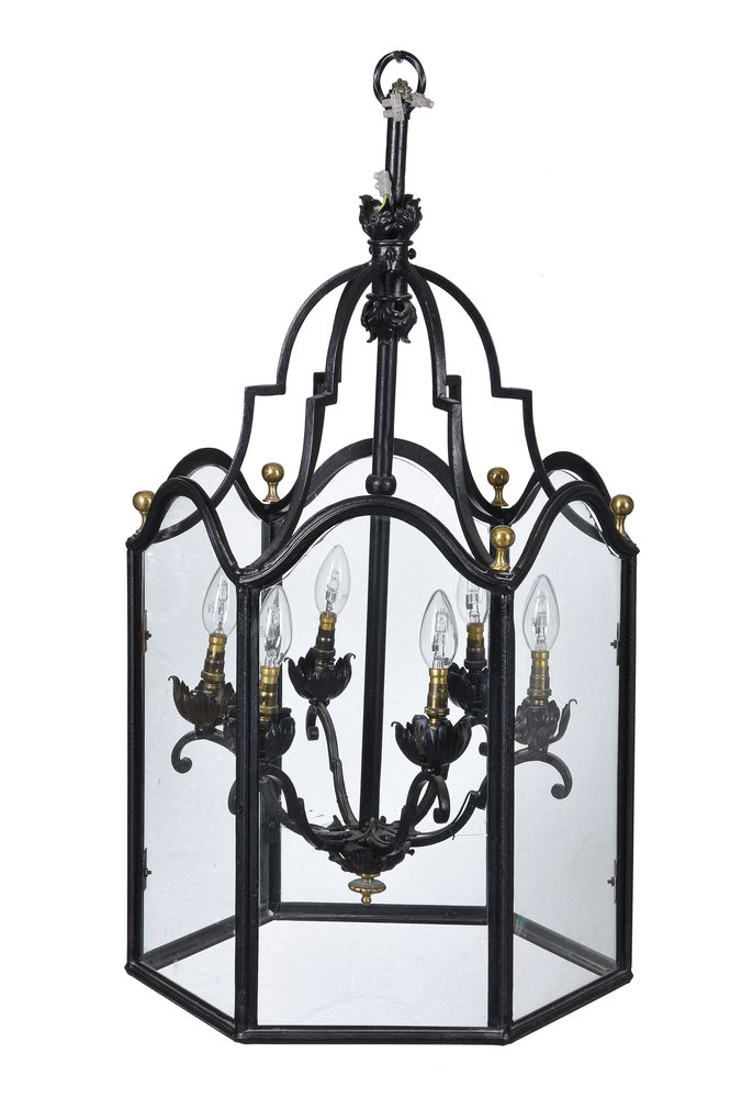 A black painted metal hall lantern in George III style