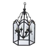 A black painted metal hall lantern in George III style