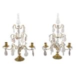 A pair of cut glass and brass twin light lustre candelabra in 18th century taste