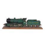 A vintage model of a 2 ½ inch gauge live steam Great Western Railway 2-6-0 Class 4300 tender locomot