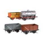 A collection of twenty-five gauge 1 open goods wagons and tankers