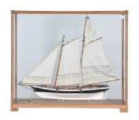 A cased model of the racing yacht ‘America’