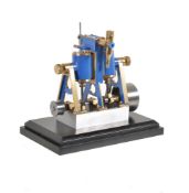 A model of a twin cylinder oscillating live steam marine engine