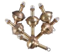 A collection of six polished brass marine floats