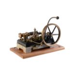 A well-engineered vintage model of a horizontal live steam mill engine