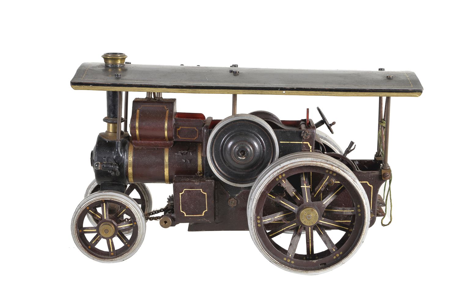 An unusual 1930’s tinplate static model of a road locomotive