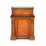 A Regency pollard oak library cabinet