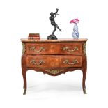 ϒ A French rosewood and tulipwood serpentine commode