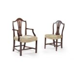 A set of twenty two mahogany dining chairs