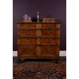 A Charles II oak chest of drawers