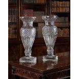 A matched pair of modern substantial cut glass baluster vases