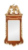 A George II mahogany and parcel gilt wall mirror