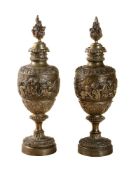 A pair of Continental gilt bronze models of urns in Neoclassical taste