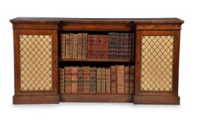 ϒ A Regency rosewood inverted breakfront cabinet bookcase