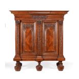 A substantial North German or Dutch figured walnut cupboard or ‘Hallenschrank’